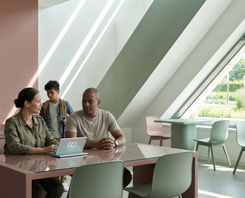 a family sits at a kitchen table, deep in conversation, hinting at mental health support.
