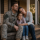 sad family of veteran and daughter sitting on porch, needing veteran housing assistance.